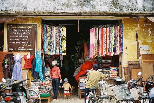 cloth market #2 by twinleaves, on Flickr - The Darker Side of Hoi An Tailors